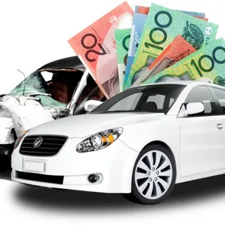 Cash for Cars service in West Melbourne with a tow truck picking up an old vehicle