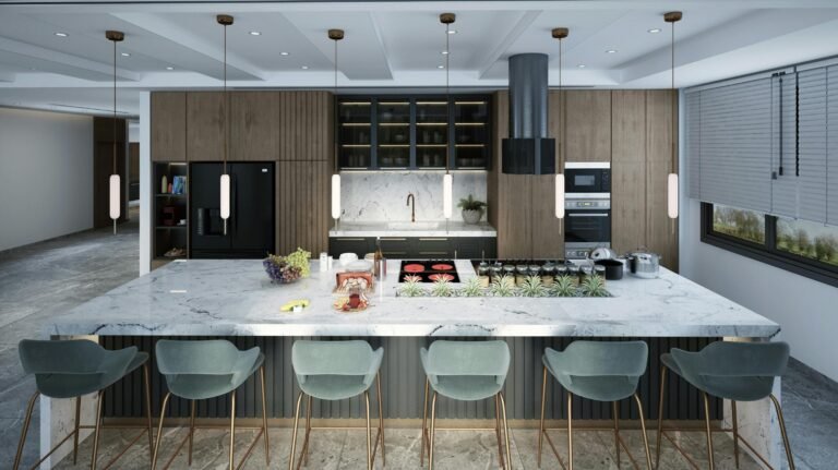 Elegant kitchen design with a marble island and chic chairs, highlighting premium kitchen essentials.